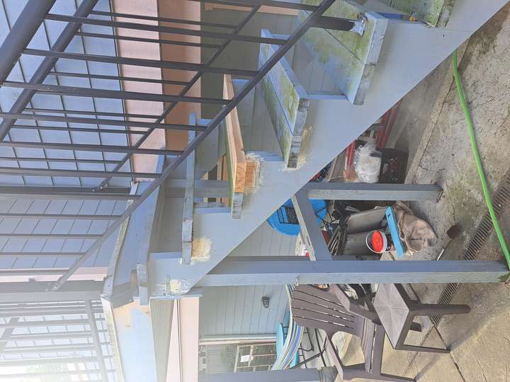 rotten stairs in need of repair by Hennessey Handyman