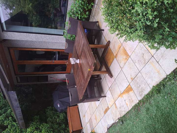 Back deck and table after pressure washing