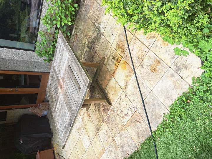 Back deck and table before pressure washing