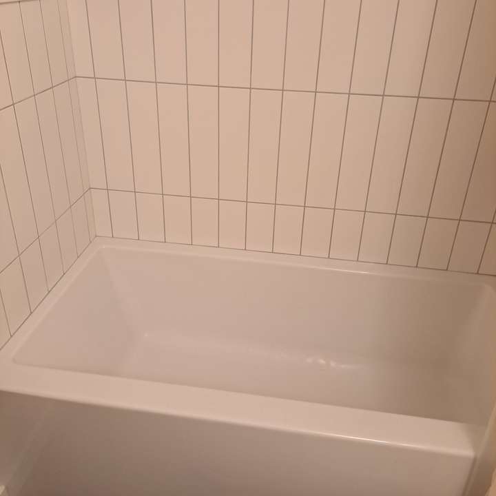 Bathtub fully re-caulked to keep water out of walls