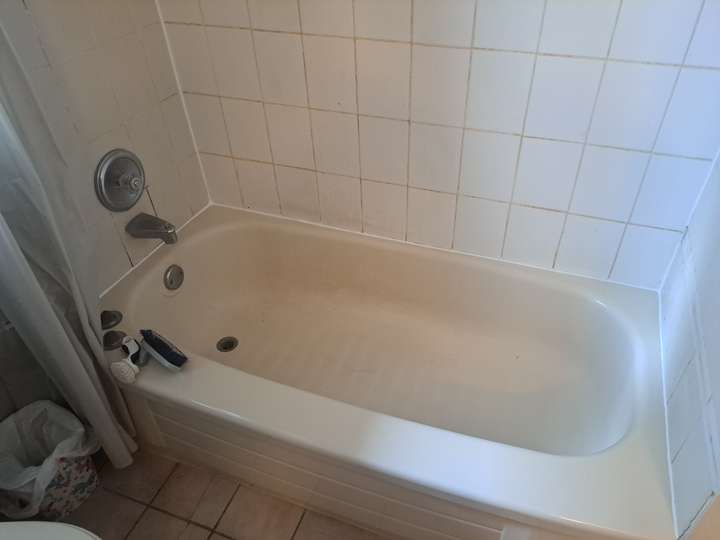 re-caulked bathtub to keep rot away