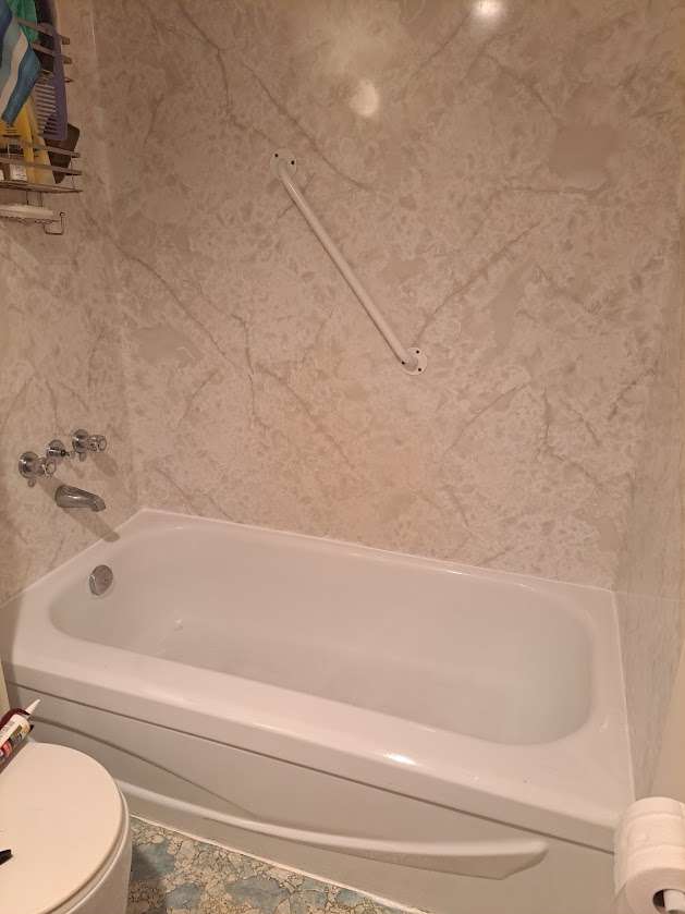Bathtub caulking done by Hennessey Handyman