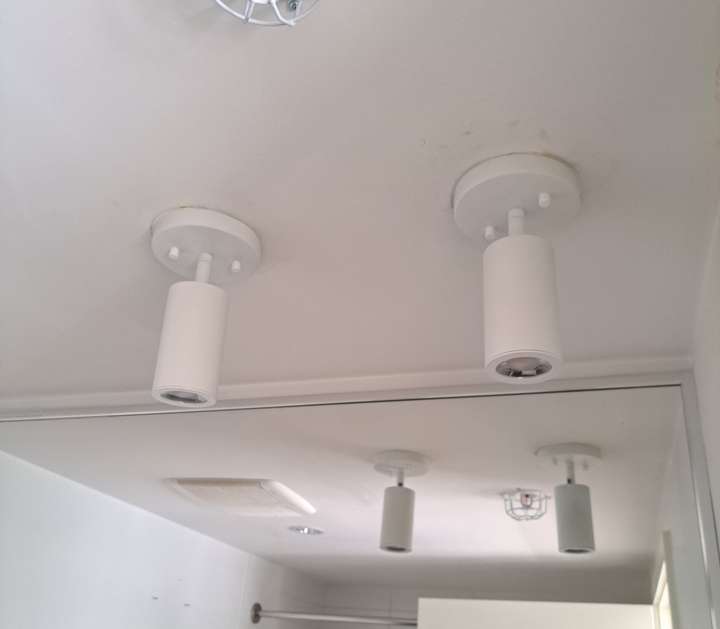 Two light fixtures replaced in bathroom