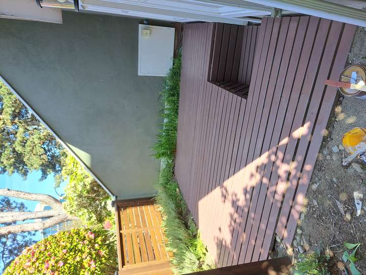 Wooden deck restained by Hennessey Handyman
