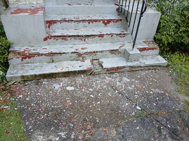 before patching and painting broken concrete stairs