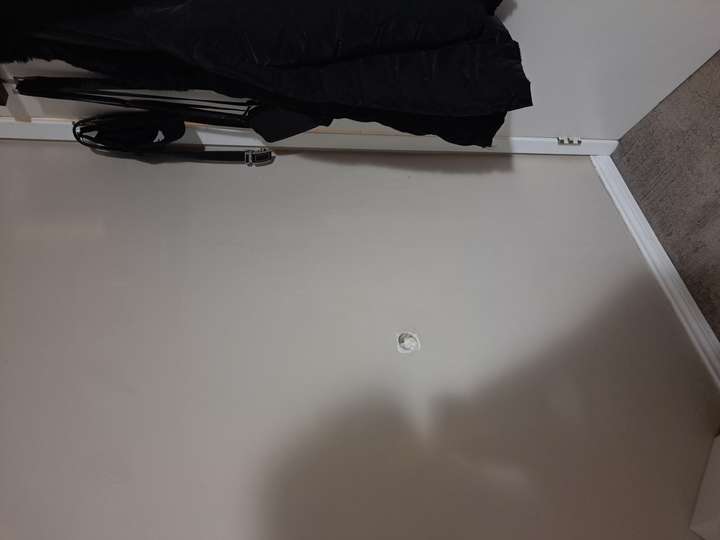 before filling and repainting drywall hole from door knob