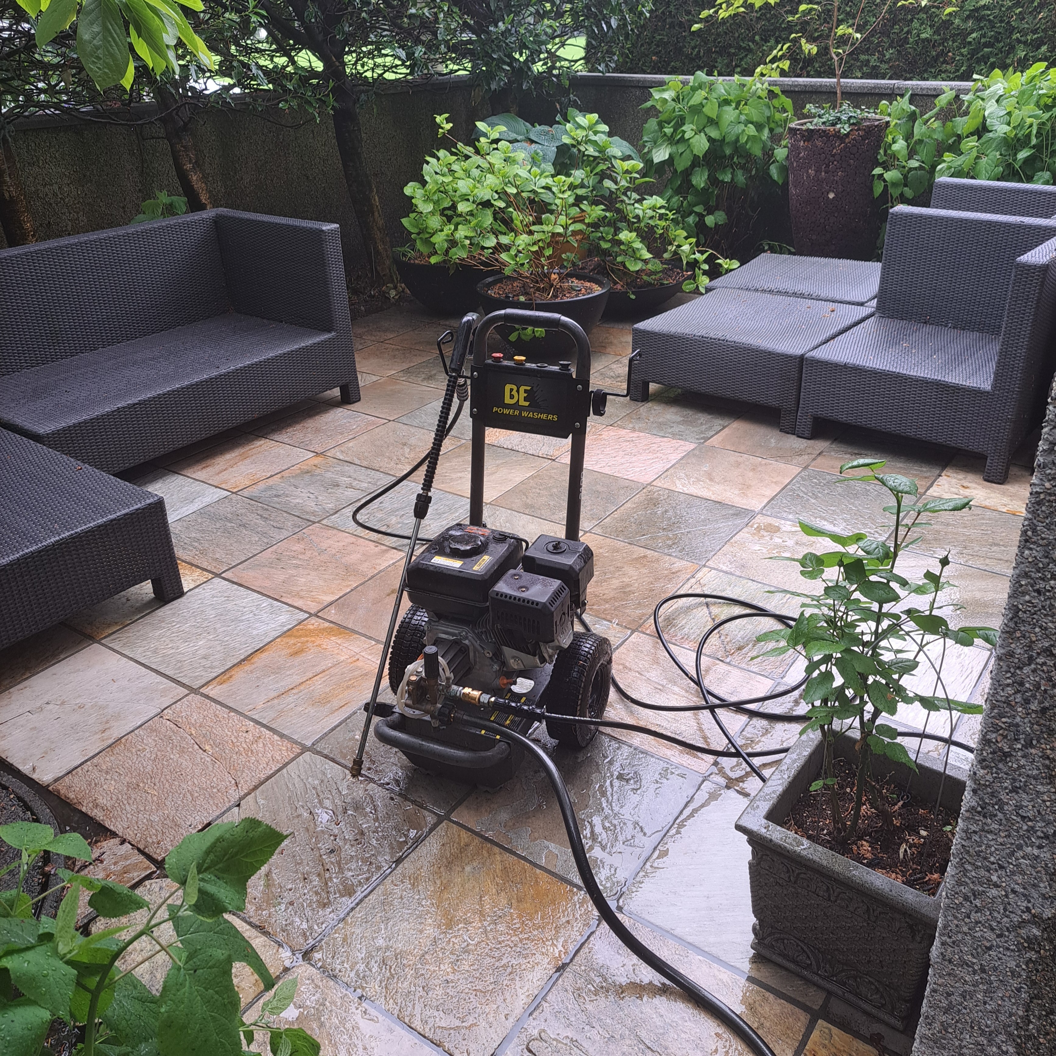 pressure washing stone tiles on front porch