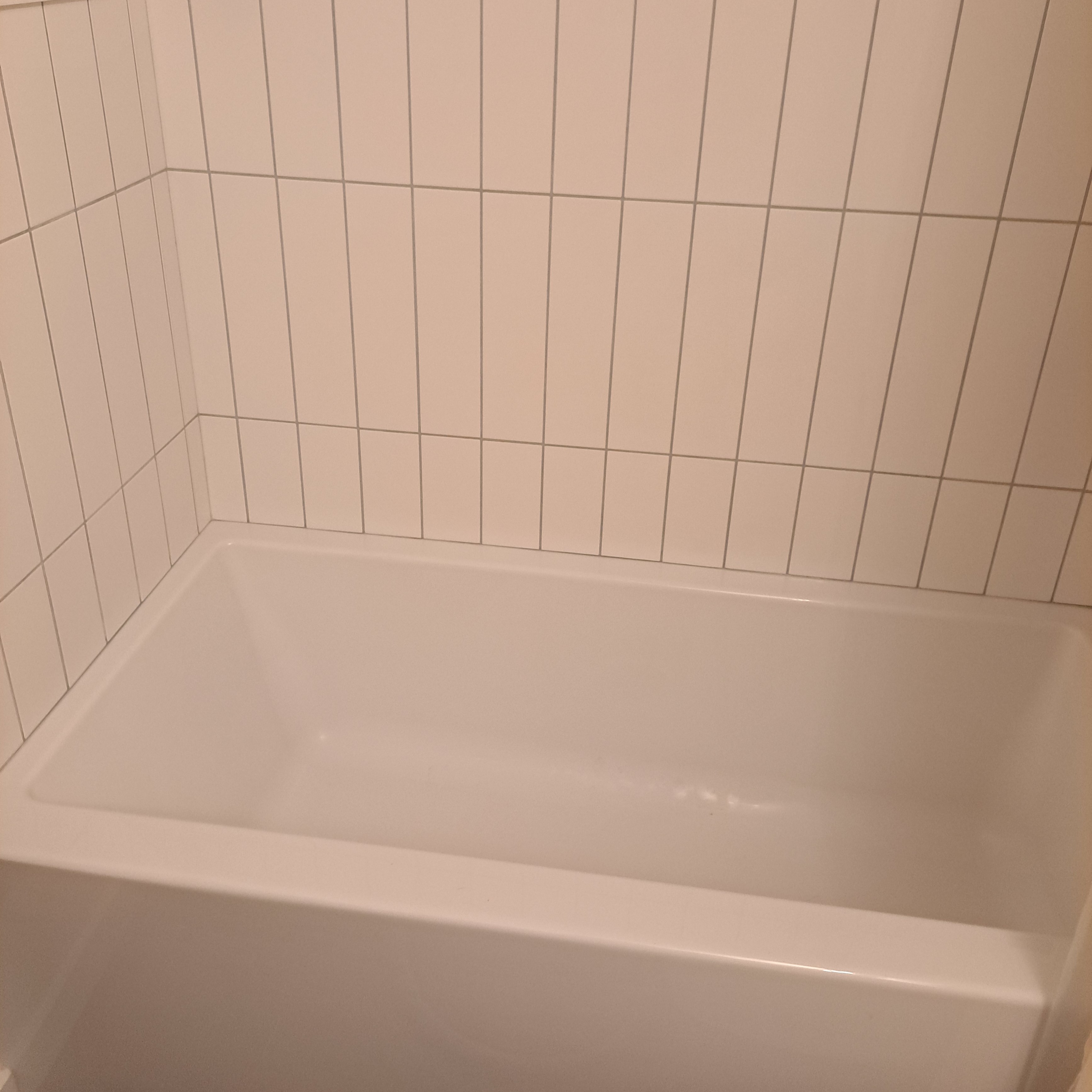 Bathtub re-caulking Hennessey Handyman