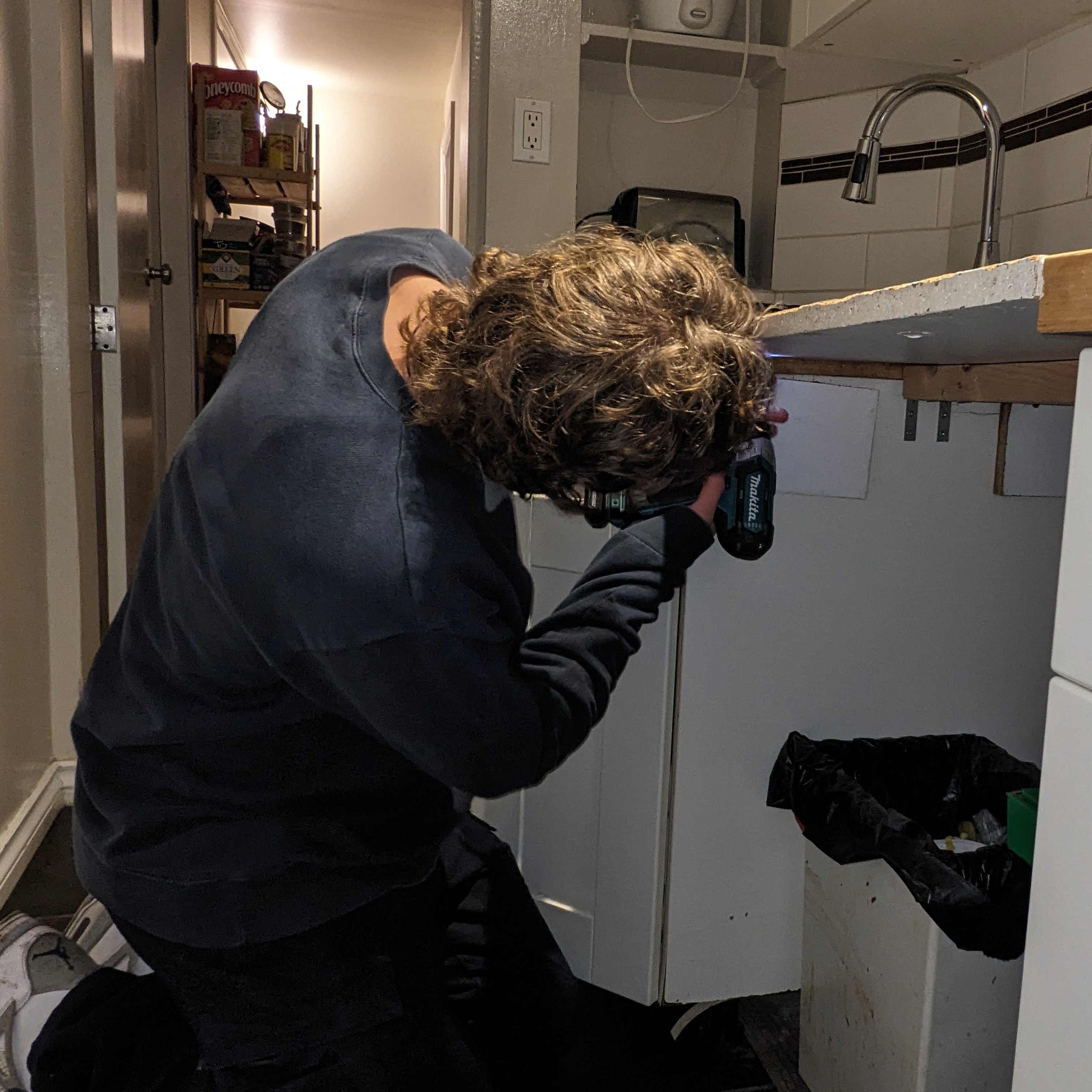 Handyman working on a counter-top replacement